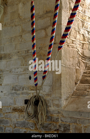 Bell ropes in St. Andrew`s Church, Glaston, Rutland, England, UK Stock Photo